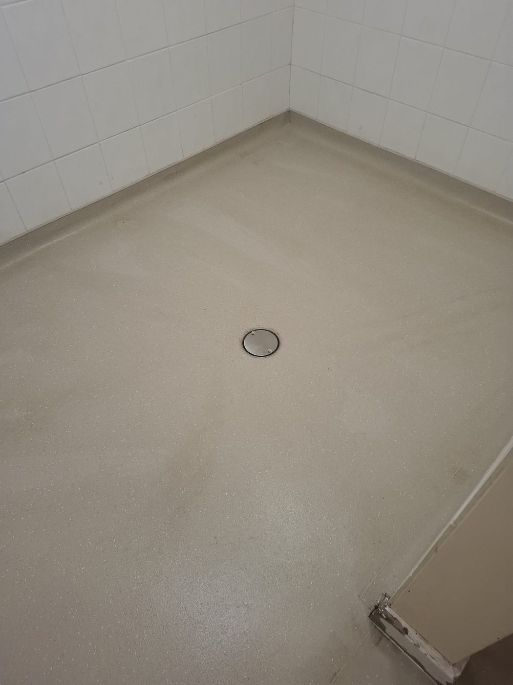 Same Needham Market FC washroom floor after Eastrada deep clean, ingrained dirt lifted and surface restored