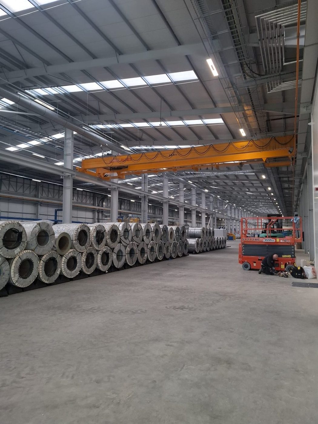 Industrial steel coil storage facility with overhead crane cleaned by Eastrada